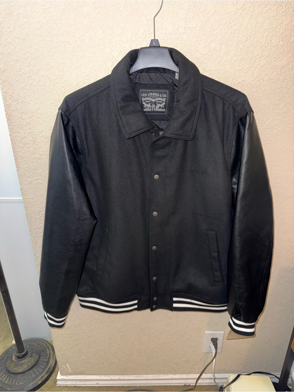 Men’s Levi Strauss & Co. black varsity jacket